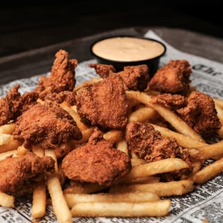 Popcorn Chicken Served with Fries & Fresh Fruit Cup